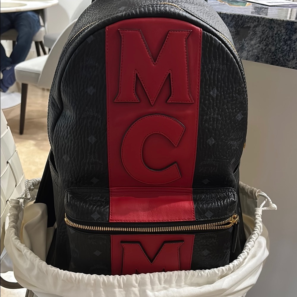MCM Black and Red Structured Backpack with Gold-Tone Hardware